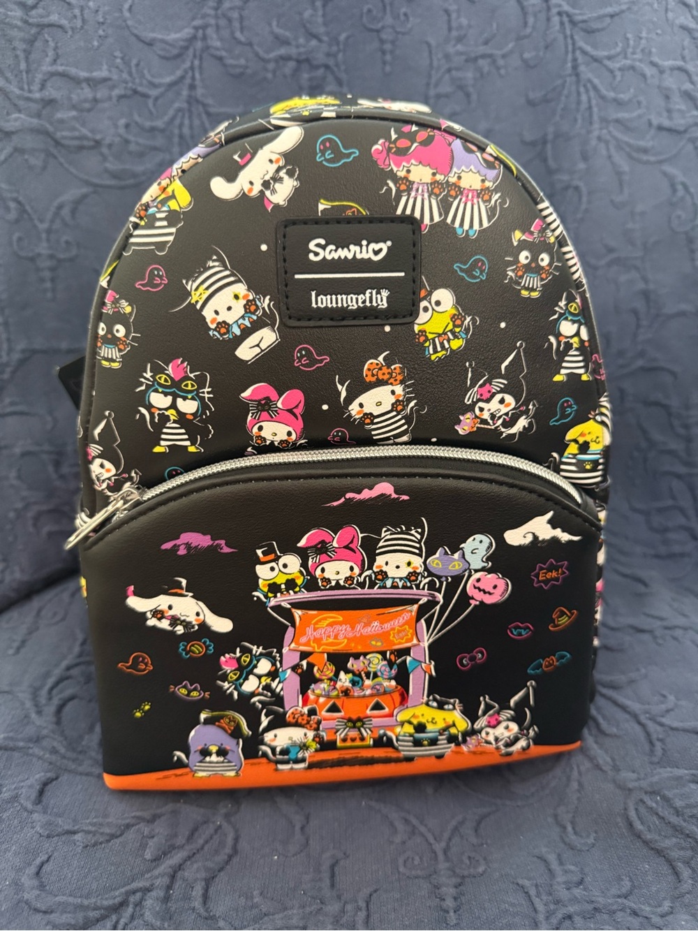 LOUNGEFLY Sanrio Black Mini Backpack with Colorful Character Print